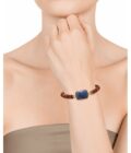 Pulsera Viceroy Chic dorada con piedras en negro, azul y beige.